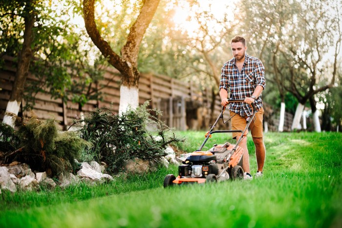 A gardener is mowing a 20 by 40 yard